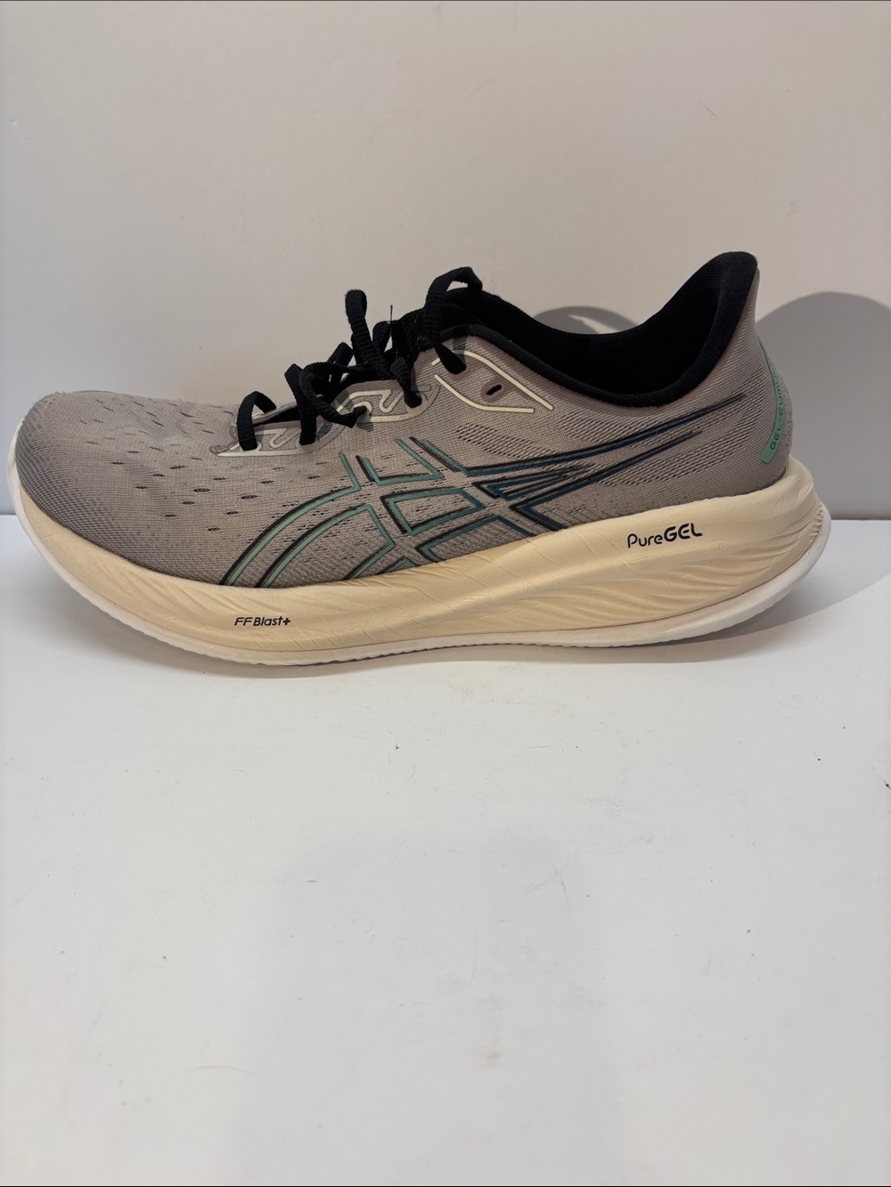 Asics men’s Grey Running Shoe with Teal Logo Accents size 14